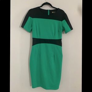 Emerald green & black knee length dress.